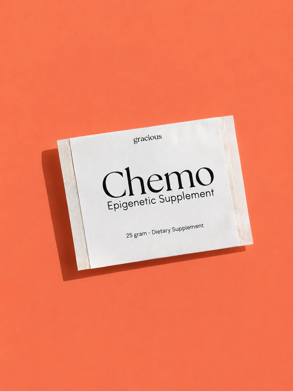 Gracious Chemo epigenetic supplement sachet on a coral background
